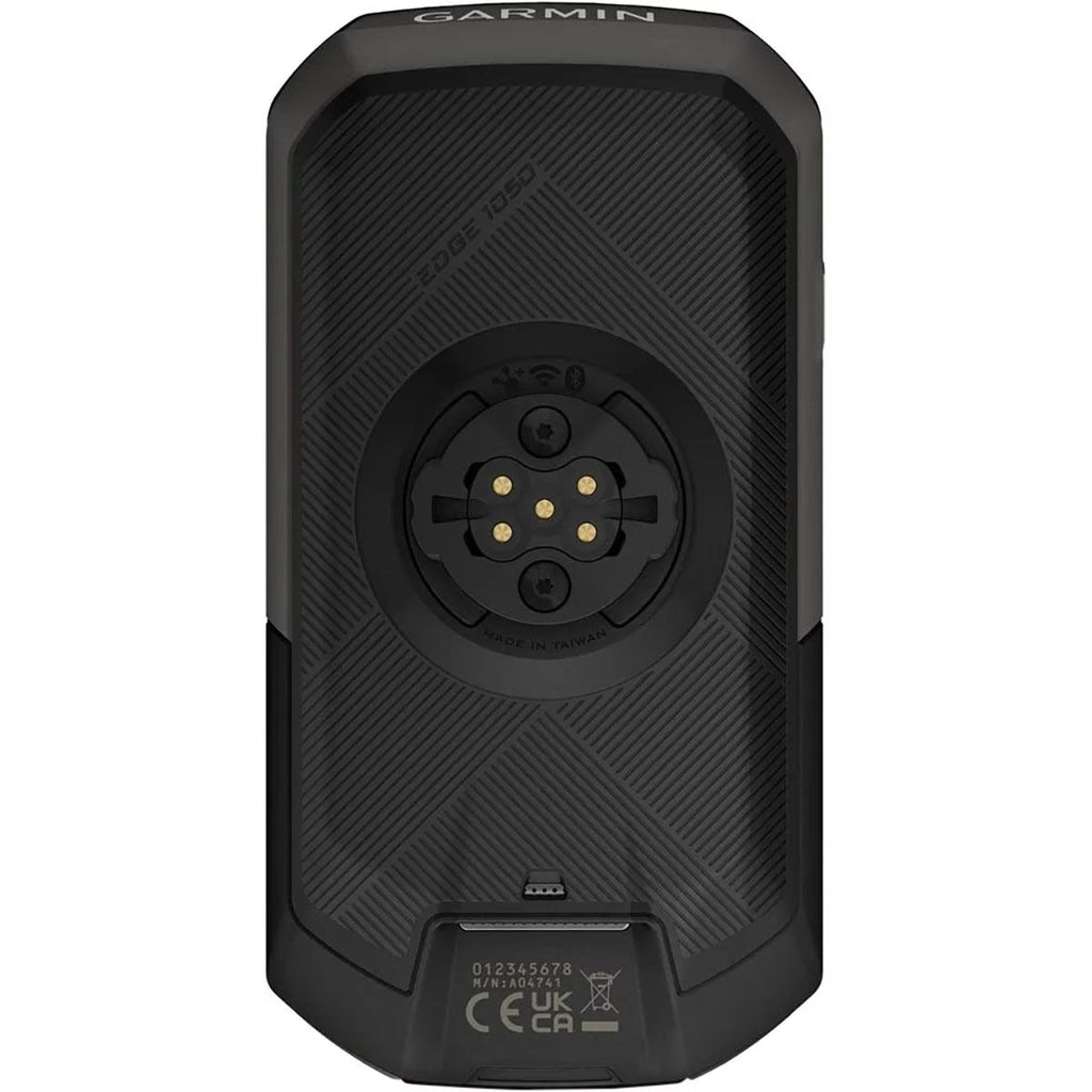 Garmin Edge 1050 rear view showing the quarter-turn mount and charging port